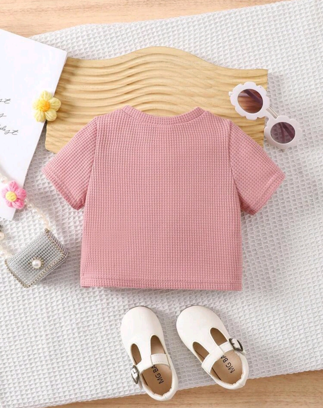 Blusa, remerita, rosa con detalle, flor, moño, Cod 1003