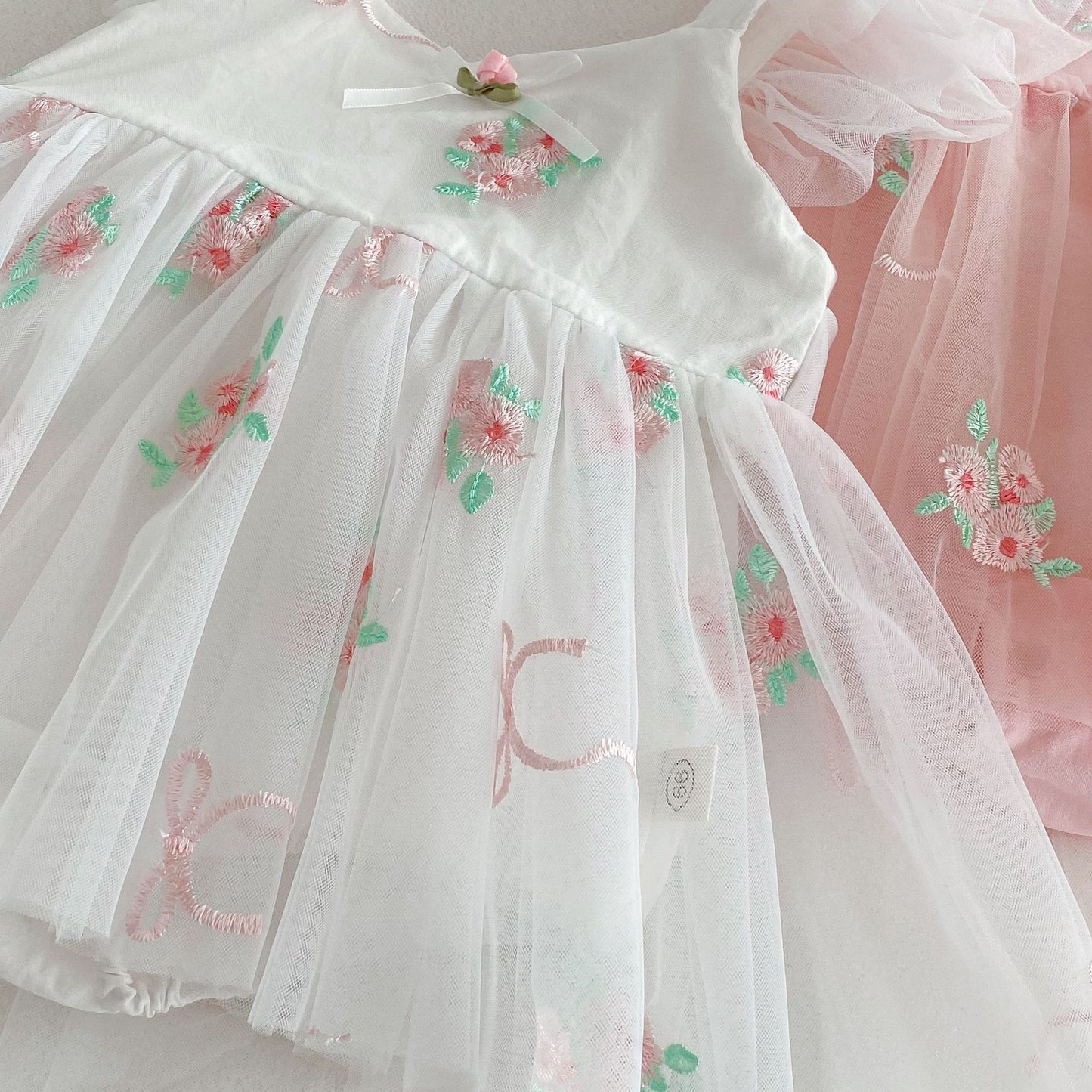 Vestibody blanco con diseños rositas🌸 1106
