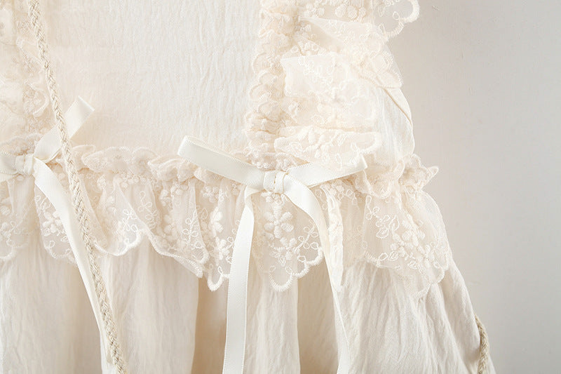 Vestido beige más carterita, moños 2067