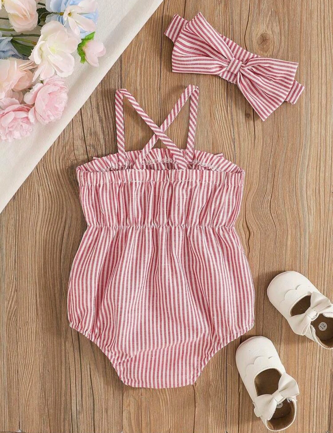 Body rosa a rayas, moño 🎀🩷 3425
