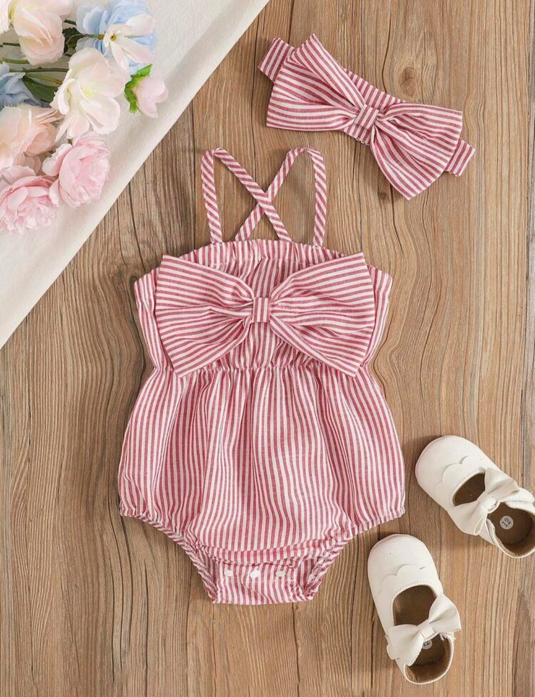 Body rosa a rayas, moño 🎀🩷 3425