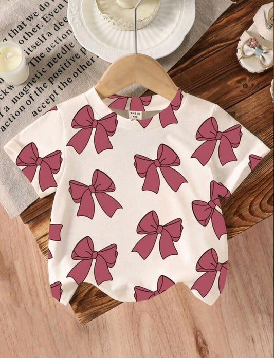 Remerita, blusa, mangas cortas, cuello redondo, diseño moños🎀 1190