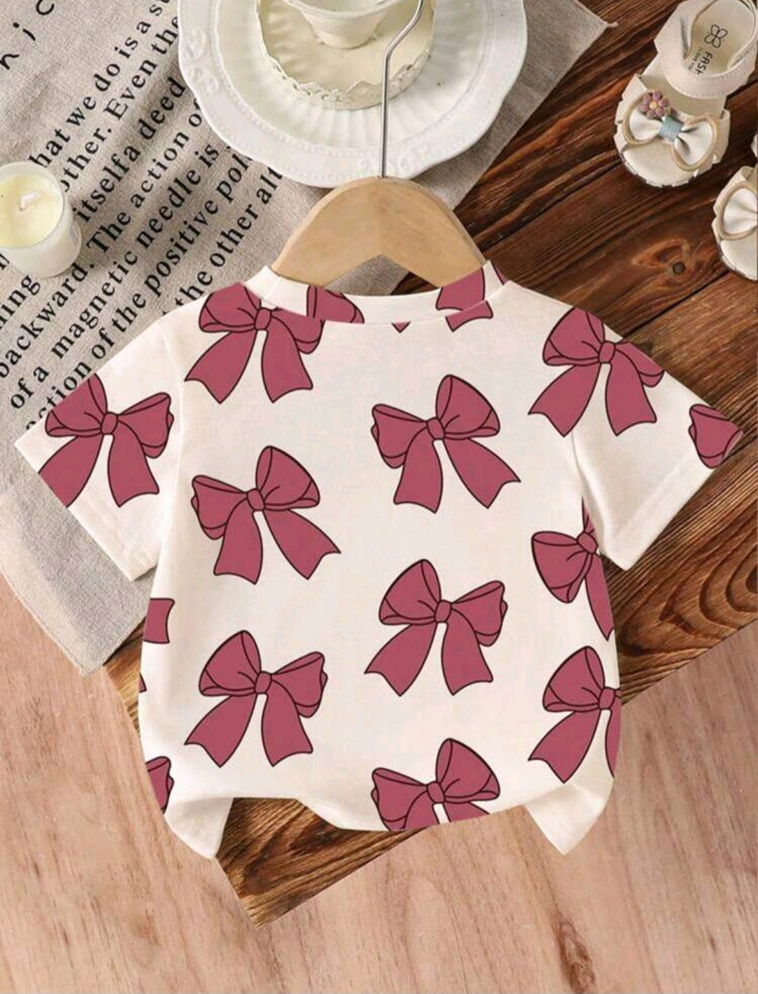 Remerita, blusa, mangas cortas, cuello redondo, diseño moños🎀 1190
