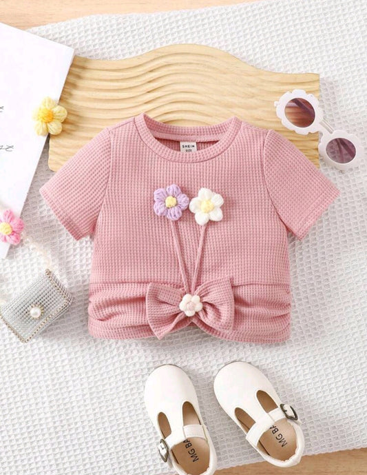 Blusa, remerita, rosa con detalle, flor, moño, Cod 1003