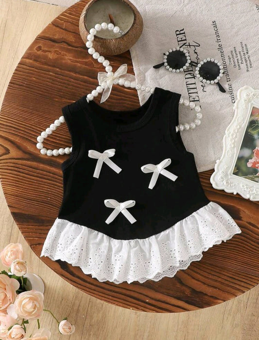 Blusa negra con moñitos blancos🖤🎀 1169